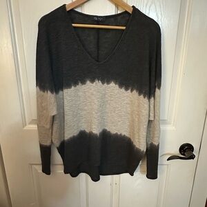 Gray and Cream V-Neck Sweater with Artistic Design